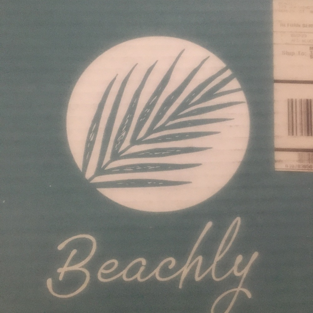 Beachly straw clutch.